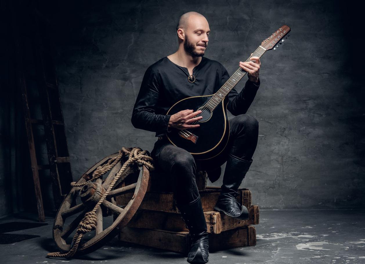 Traditional folk musician dressed vintage celti
